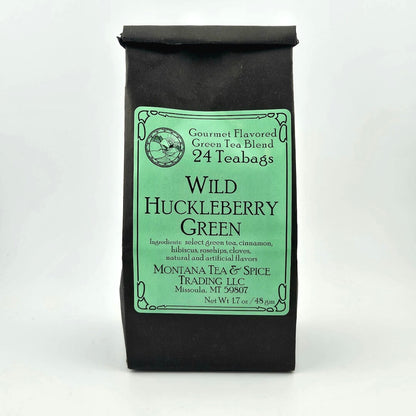 Black paper bag with rolled top with sage-green label describing flavor and ingredients. 