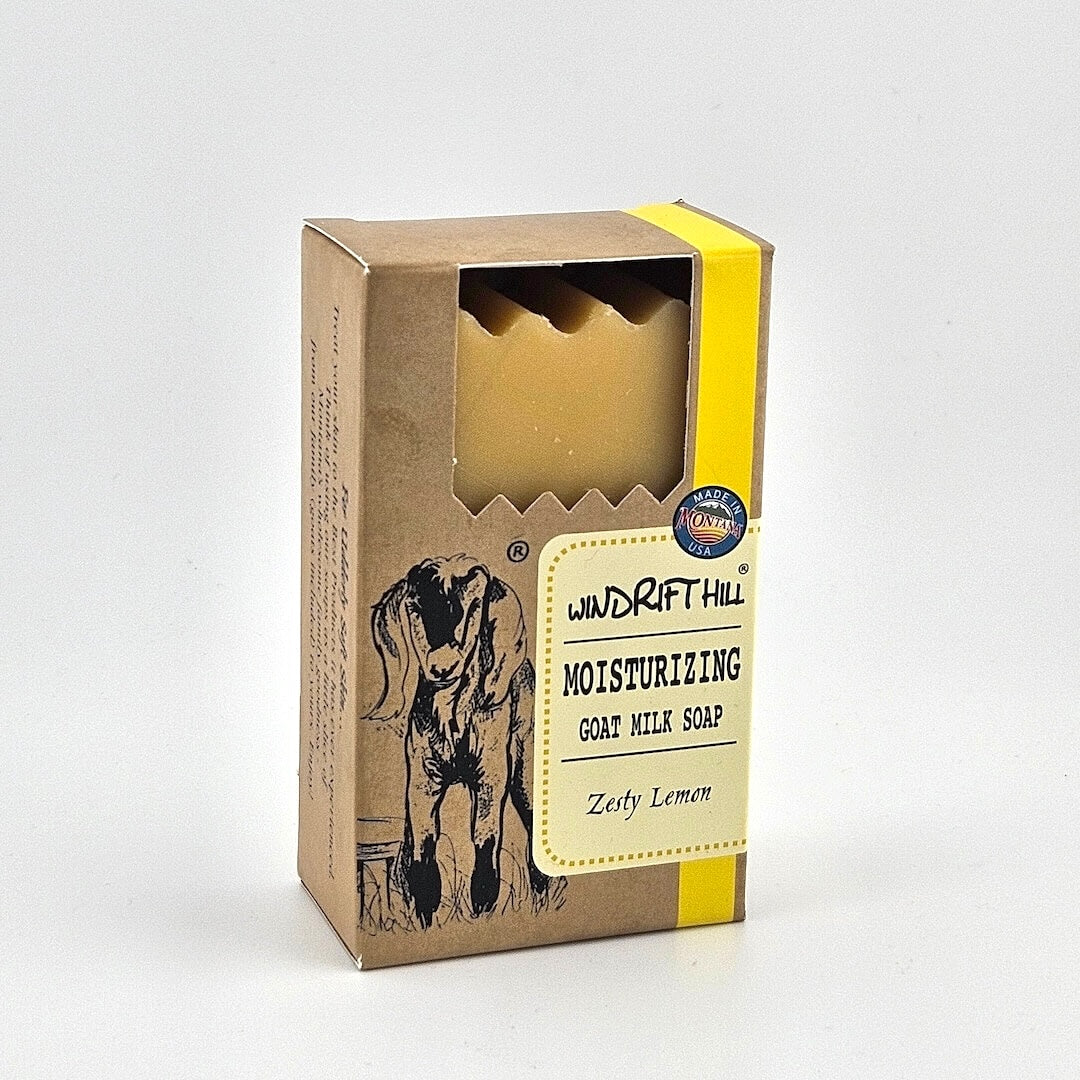 Box of Windrift Hill moisturizing goat milk soap on a gray background