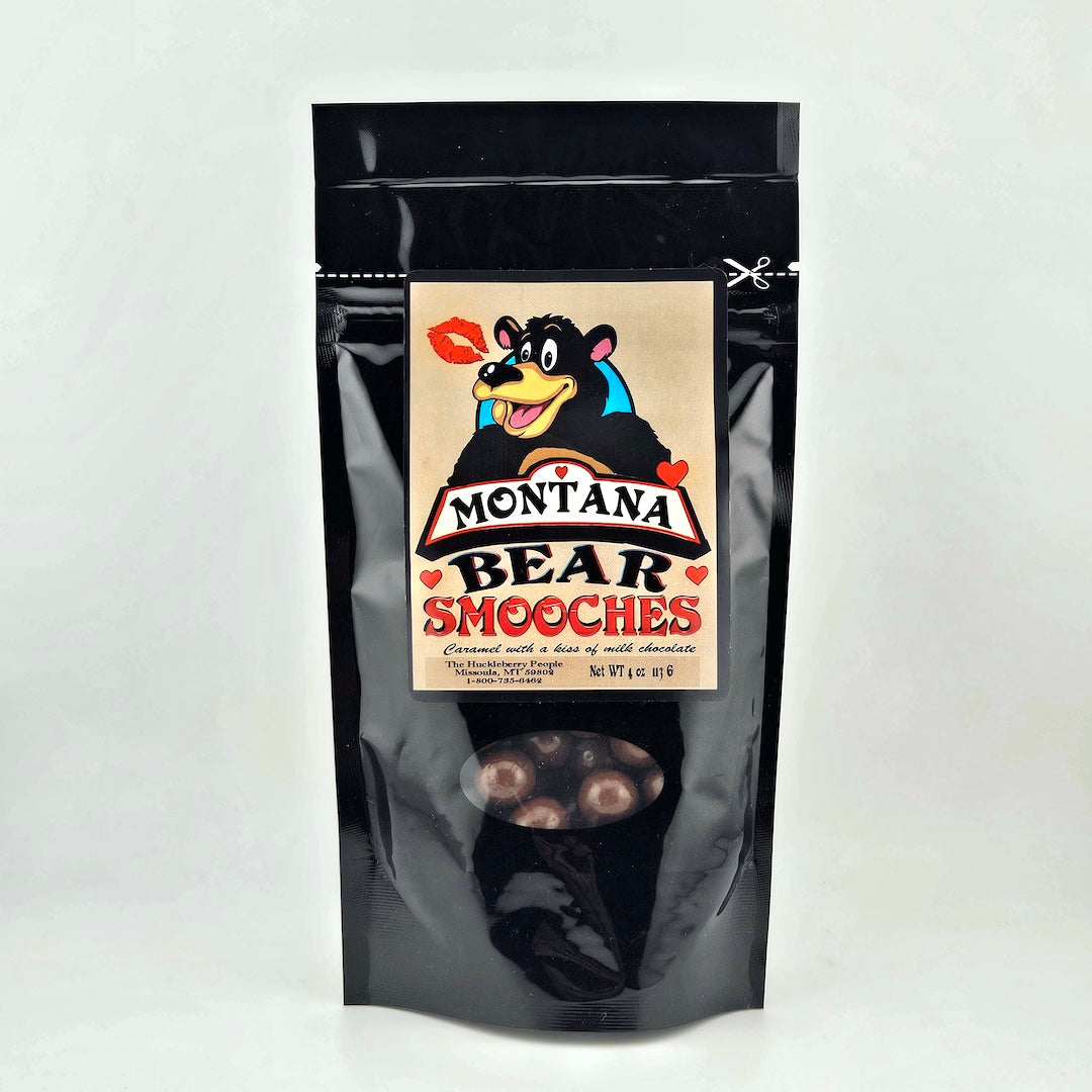 Black packaging of Montana Bear Smooches with a bear illustration on a white background