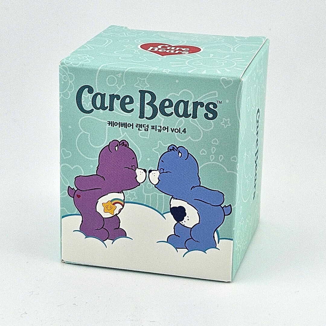 Care Bears toy box with two bears embracing on a light blue background