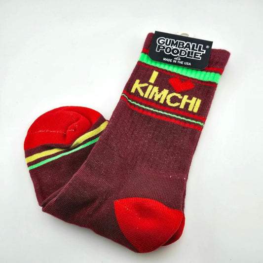 Maroon socks with red heels and toes, with yellow, green, and red stripes with text, "I [heart symbol] kimchi."