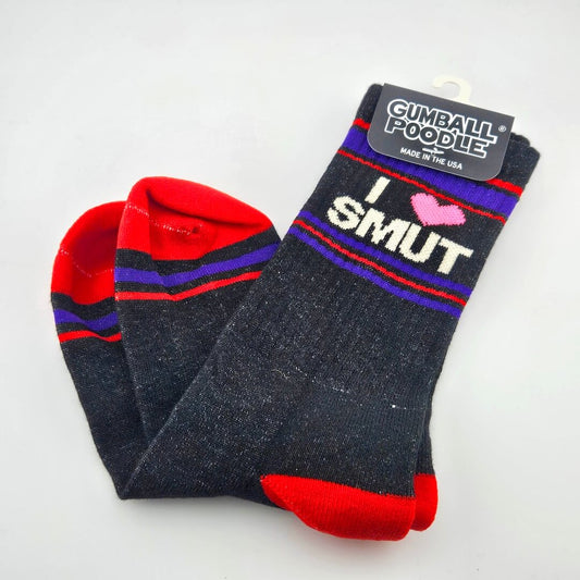Navy blue socks with red toes and heels, blue and red stripes with text, "I [heart symbol] Smut."