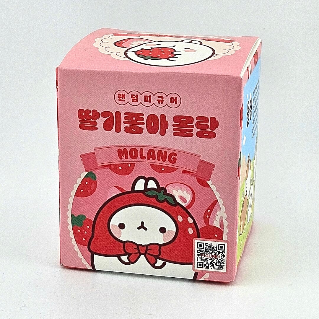 Pink box with a cartoon character and Korean text on a gray background