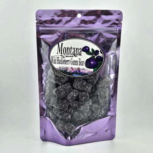 Purple package of Montana Wild Huckleberry Gummi Bears on a white background