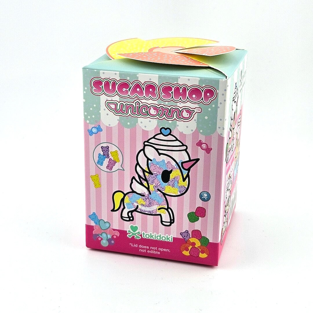 Colorful packaging of a tokidoki Sugar Shop Unicorno toy on a white background